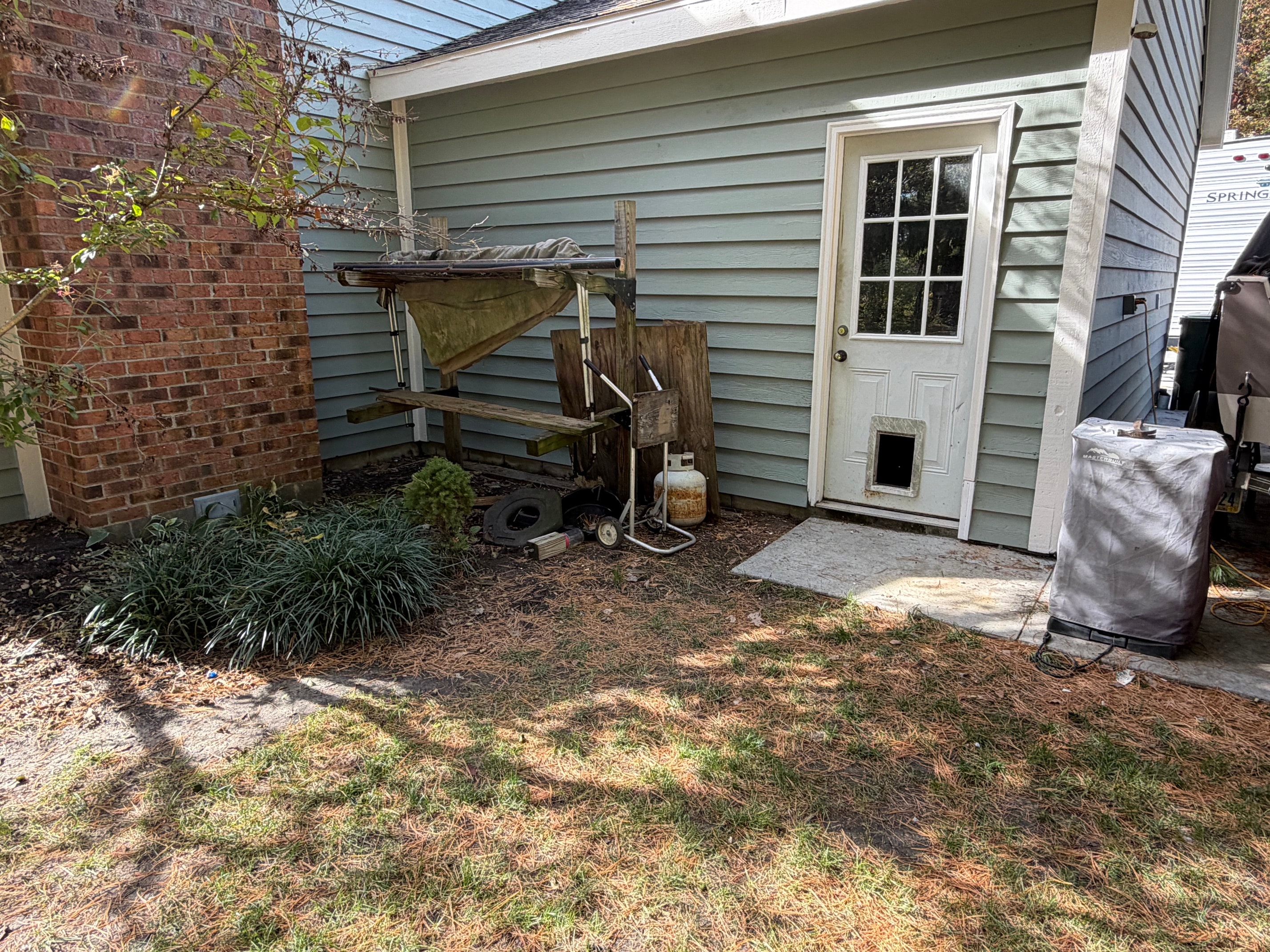 Finished house exterior after cedar repair and painting